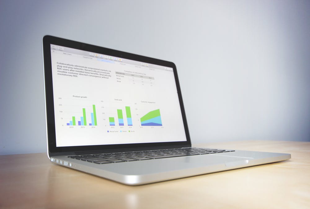 laptop's screen showing data analytics